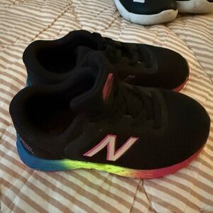 New Balance Kids Black Sneakers with Pink and Rainbow Midsole